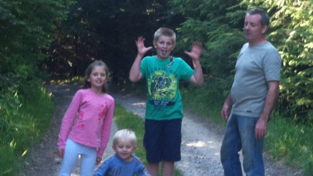 From left Saoirse, Conor and Soren O’Shea with their father Brian.