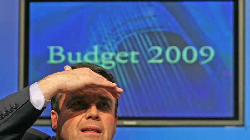 Finance Minister Brian Lenihan speaks to the media at Government Buildings in Dublin after delivering his budget for 2009. Photograph: Niall Carson/PA Wire