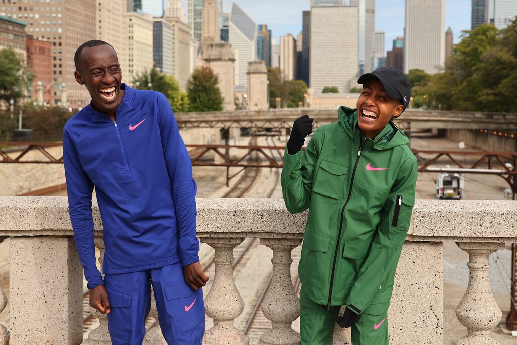 Men's professional division winner Kelvin Kiptum of Kenya and women's professional division winner Sifan Hassan of the Netherlands pose for a photo after the 2023 Chicago Marathon. Photograph: Michael Reaves/Getty Images