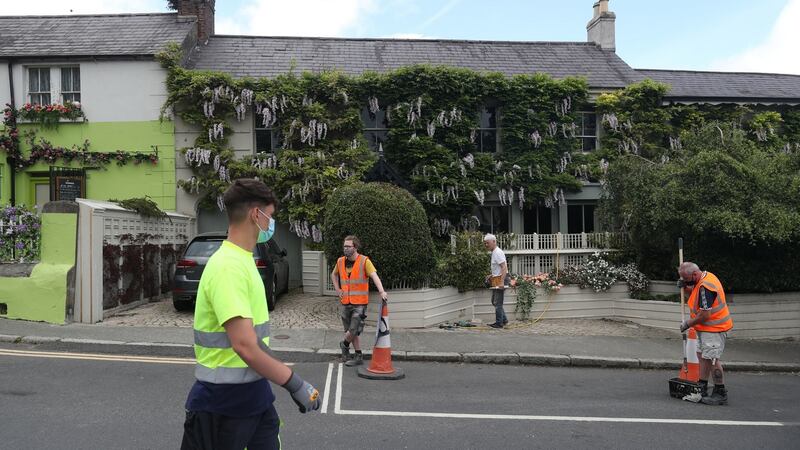 People work during the week on transforming Enniskerry village in Co Wicklow into part of the Disenchanted film set, where Disney are filming. Photograph: Niall Carson/PA Wire