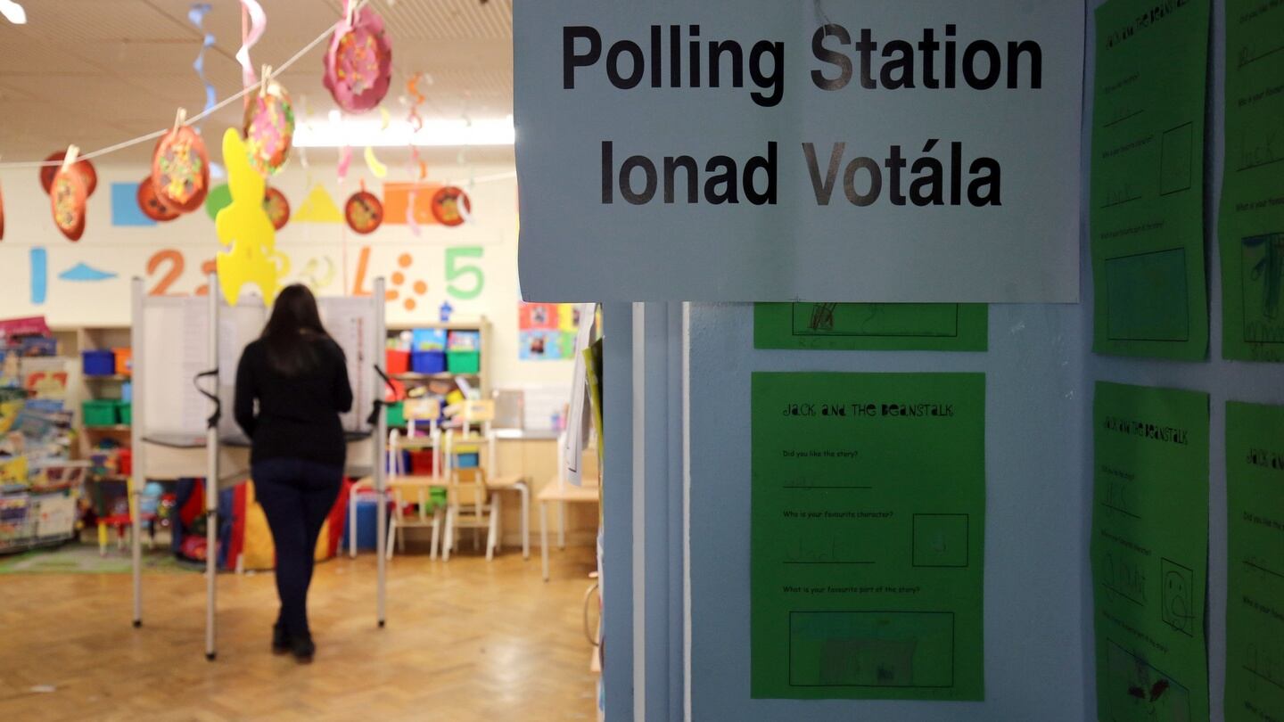 Laura Kidney casts her vote at a polling station at St. Anthony’s Boys Primary School in Ballinlough, Co Cork this morning. Photograph: Chris Radburn/PA Wire
