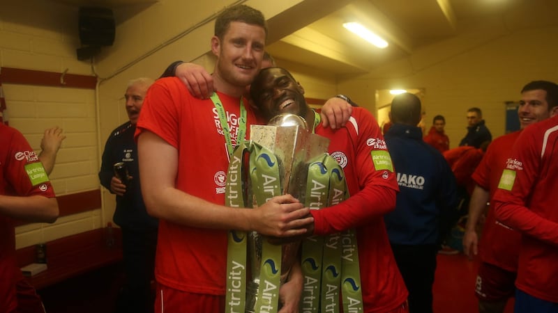 Sligo Rovers players Jason McGuinness and Joseph Ndo celebrate with the league trophy in 2012. Photograph: Donall Farmer/Inpho