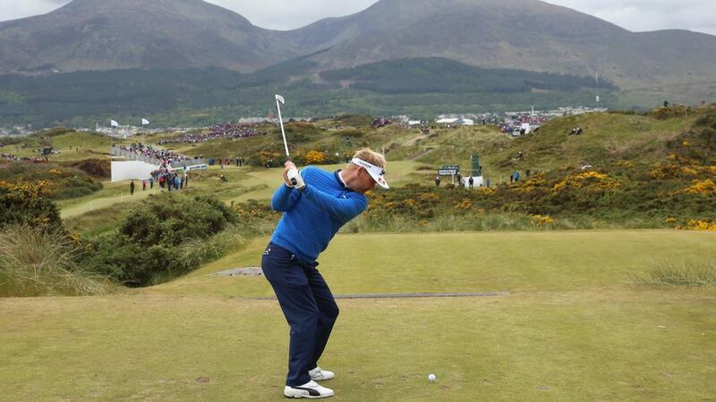 Soren Kjeldsen of Denmark tees off on the fourth hole during the third round of the Dubai Duty Free Irish Open at Royal County Down Golf Club. Photo: Andrew Redington/Getty Images