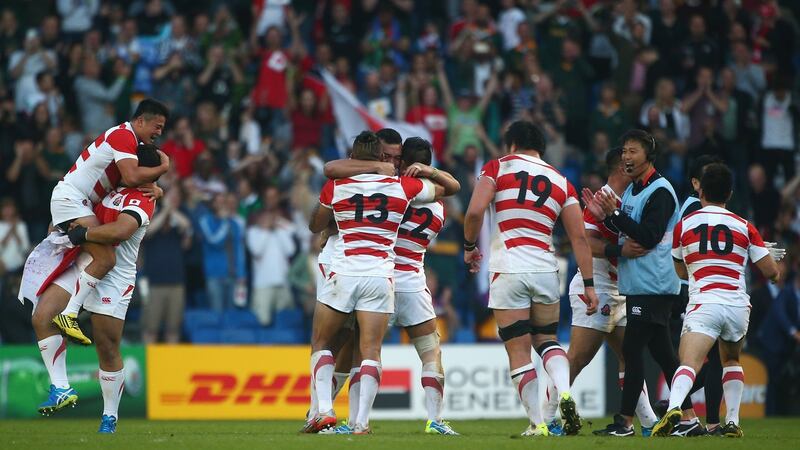 Japan celebrate their shock win over South Africa at the 2015 Rugby World Cup. Photograph: Charlie Crowhurst/Getty