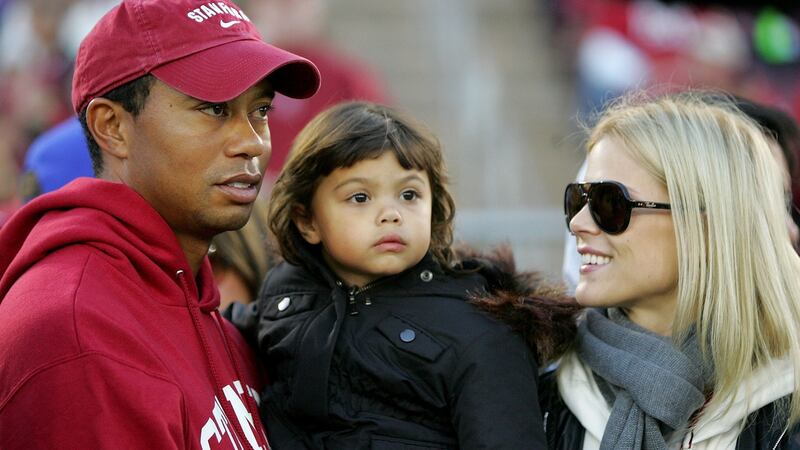 Tiger Woods with his daughter Sam and wife Elin Nordegren on November 21st, 2009. Photograph: Ezra Shaw/Getty Images
