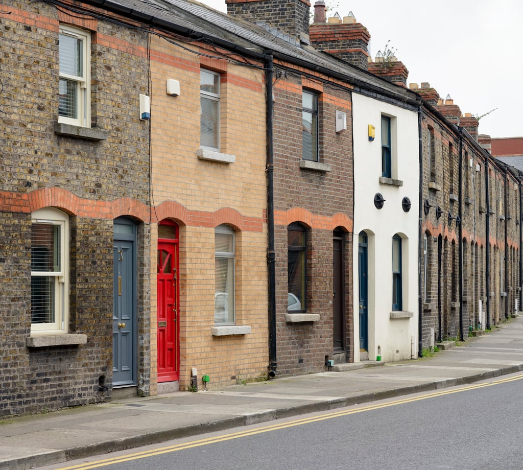 A street of traditional terraced houses in Dublin. The political slogan for the next three decades will be houses, houses, houses – nothing else matters