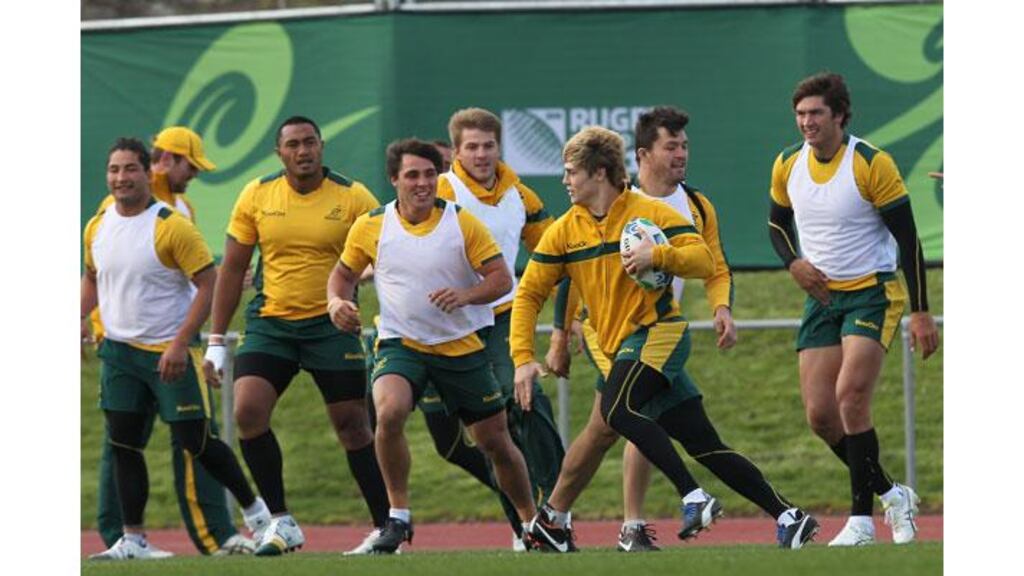 James O’Connor gives his teammates the runaround as Australia prepare to face Ireland this weekend. Photograph: Billy Stickland