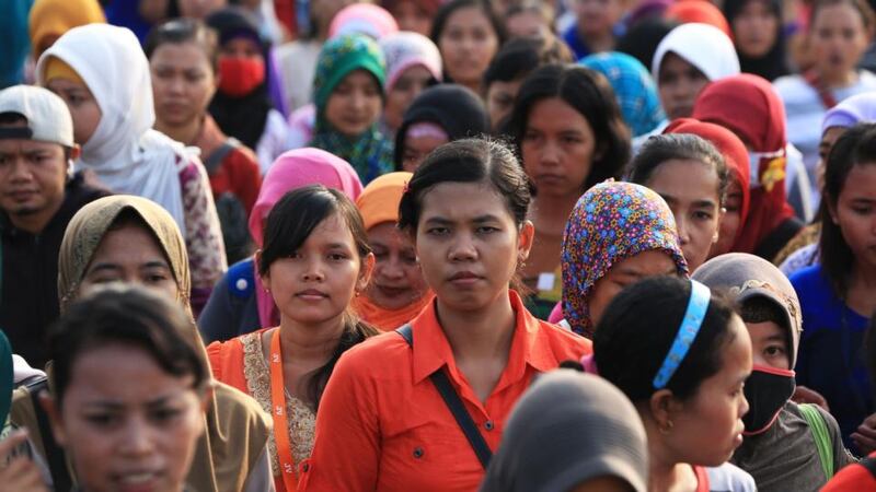 Women light candles while they take part in a rally to commemorate International Women’s Day yesterday in Karachi, Pakistan. Photograph: Athar Hussain/Reuters