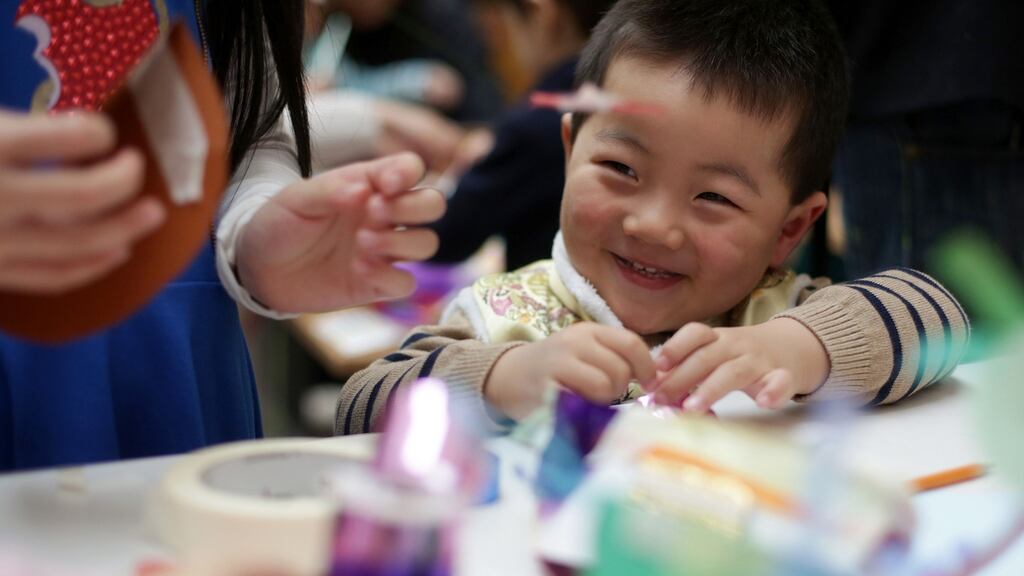 Daniel Zhang (2), from Stillorgan in Dublin, pictured during an art and craft workshop in the National Gallery in Dublin on Sunday to celebrate the start of Chinese New Year, the year of the Rooster. Photograph: Laura Hutton/The Irish Times