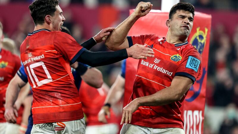 Munster’s Damian De Allende celebrates with Joey Carbery after scoring a try during the United Rugby Championship match at Thomond Park. Photograph: Dan Sheridan/Inpho