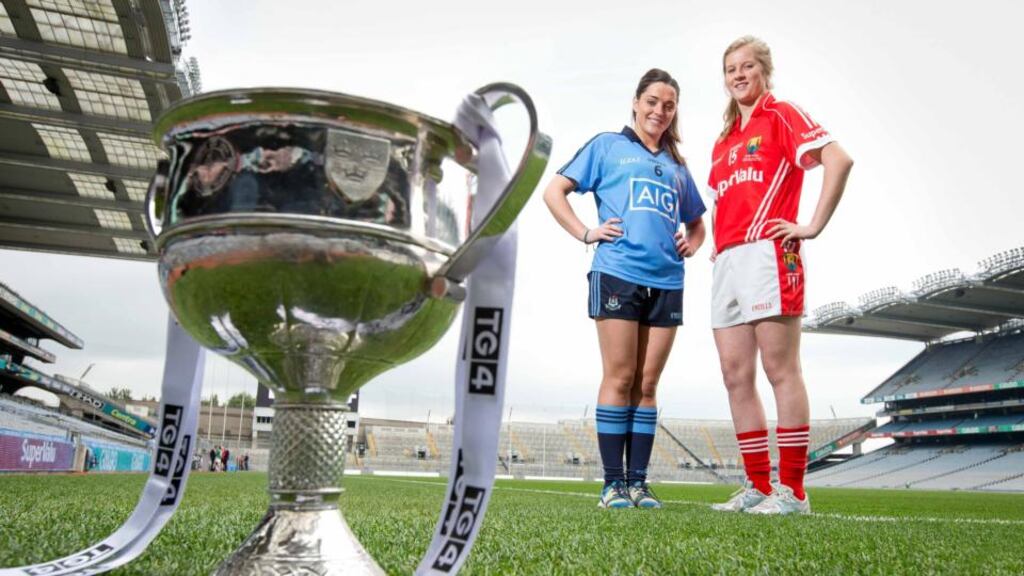 Dublin’s Sinead Goldrick and Roisin Phelan with the  Brendan Martin Cup. Photograph: Morgan Treacy/Inpho