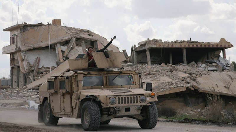 An armoured Humvee in the village of Baghouz. Photograph: Reuters