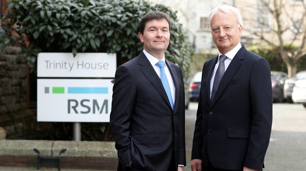 Tim Quigley, RSM’s corporate finance partner and John Glennon, the firm’s managing partner. Photograph: Jason Clarke