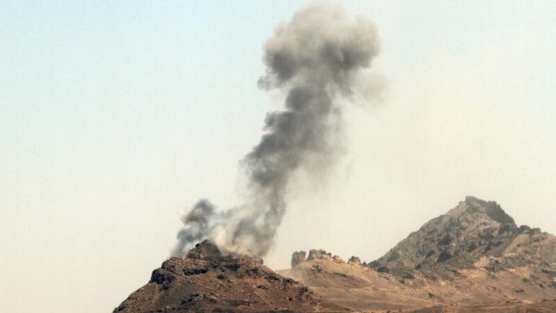 Smoke billows from military barracks in the Jabal al-Jumaima mountain following an air strike near Sanaa on Monday. Photograph: Reuters