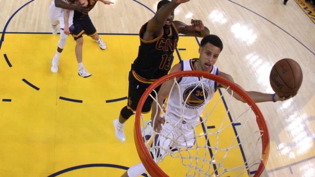 Stephen Curry helped the Golden State Warriors to 104-91 win over the Cleveland Cavaliers, leaving them one win away from the NBA title. Photograph: Afp