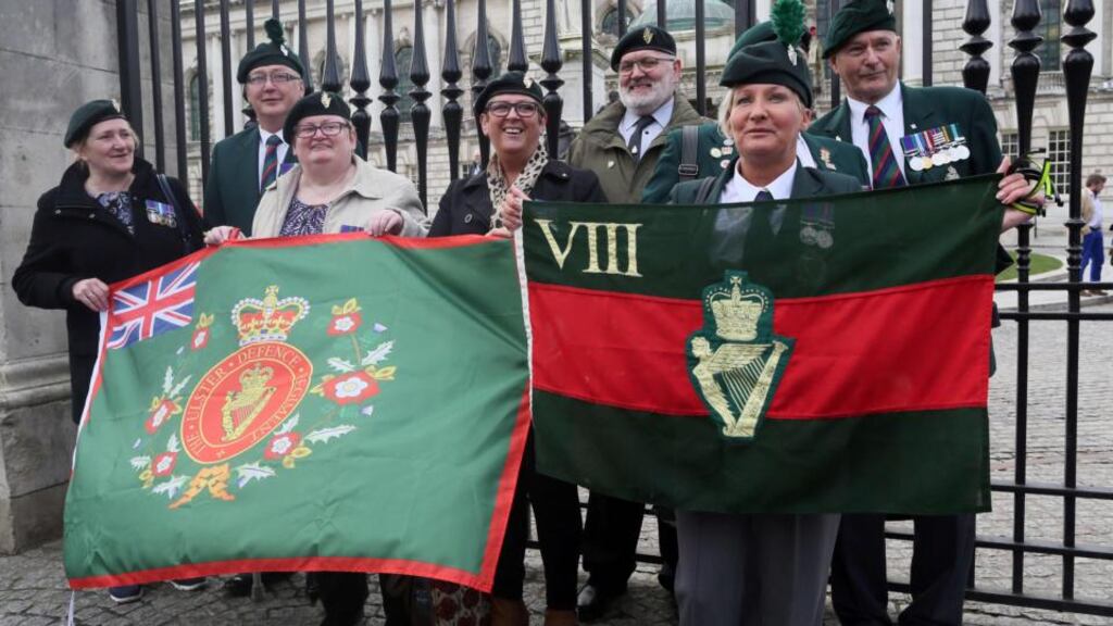 British veterans of the Troubles hold flags as they protest at the city hall in Belfast. Photograph: Paul Faith/AFP/Getty Images