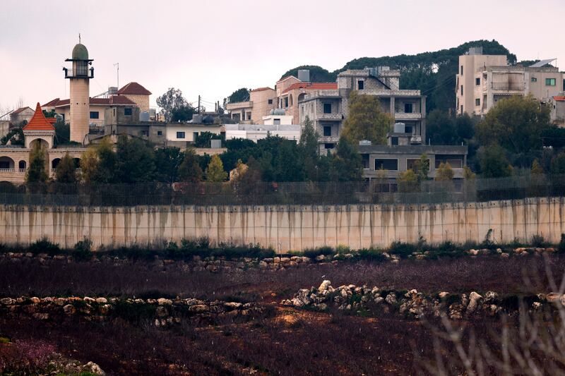 The Lebanese village of Kfar Kila sits across the border fence from Metula in Israel. Photograph: Jalaa Marey/AFP via Getty Images