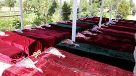 Afghan day of mourning follows scores of deaths in Taliban attack