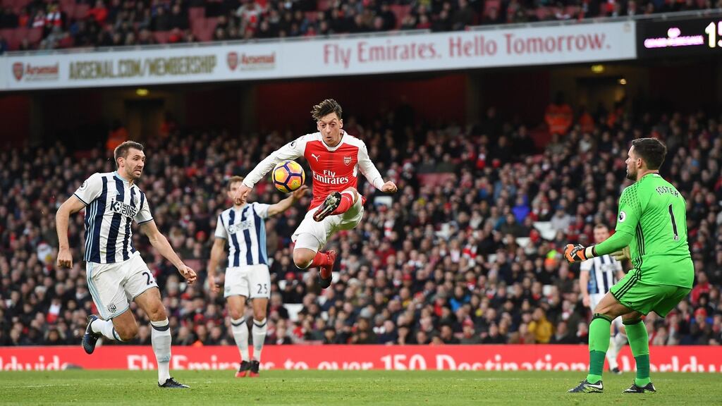 Mesut Özil wants to know Arsene Wenger’s plans before signing a new deal with Arsenal. Photograph: Epa/Andy Rain