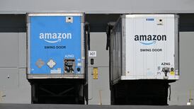 Amazon’s online sales lift earnings and send shares higher