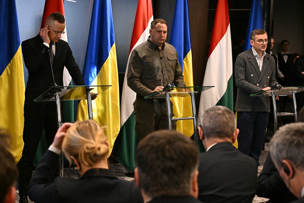 Hungarian foreign minister Peter Szijjarto (left) gives a press conference with his Ukrainian counterpart Dmytro Kuleba (right) and Ukrainian presidential chief of staff Andrij Jermak (centre) after their talks on Monday in the city of Uzhhorod near Ukraine’s border with Hungary. Photograph: Attila Kisbenedek/AFP via Getty Images