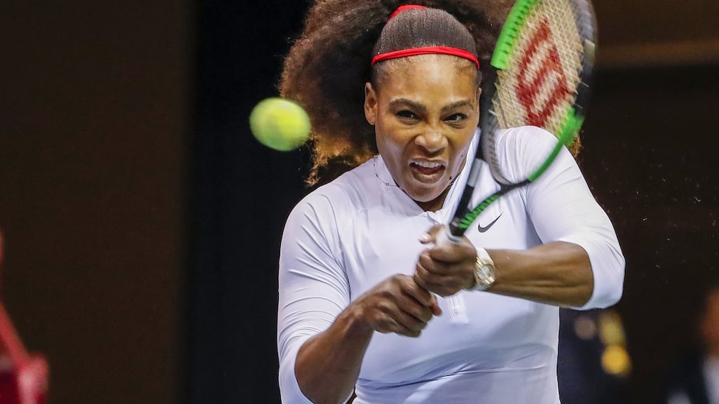Serena Williams of the US in doubles action with her sister Venus in the Fed Cup. Photograph: PA