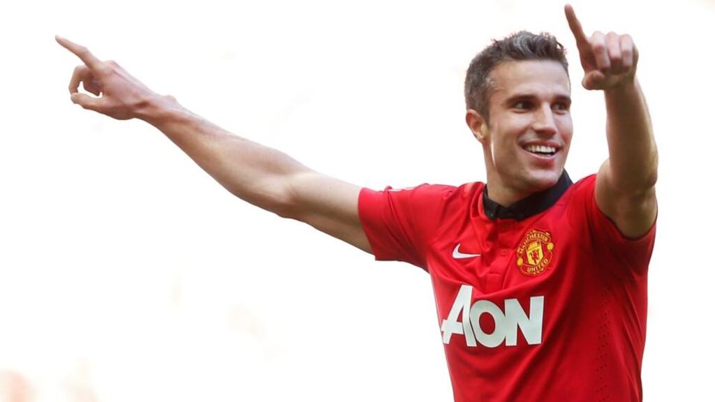 Manchester United’s Robin Van Persie celebrates scoring his team’s second against Wigan Athletic at Wembley Stadium. Photograph: Eddie Keogh/Reuters