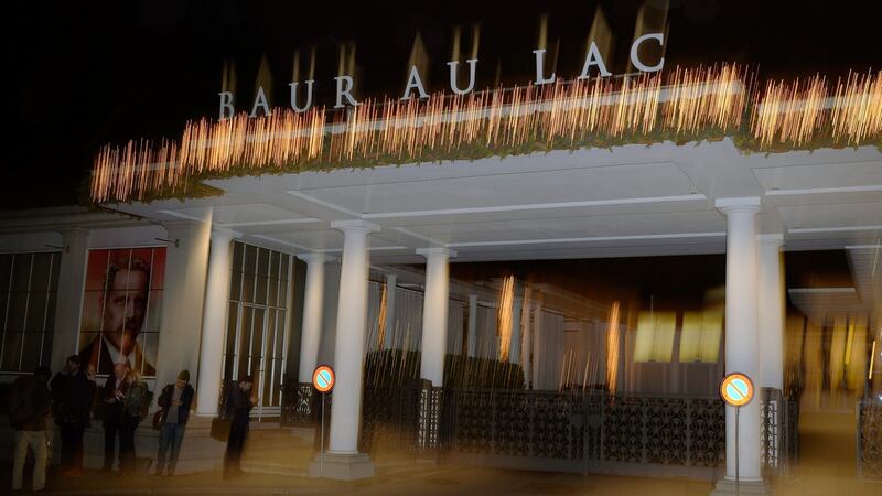 Media representatives are seen in front of the entrance of the Baur au Lac hotel in Zurich, Switzerland, on Thursday. Photograph: EPA