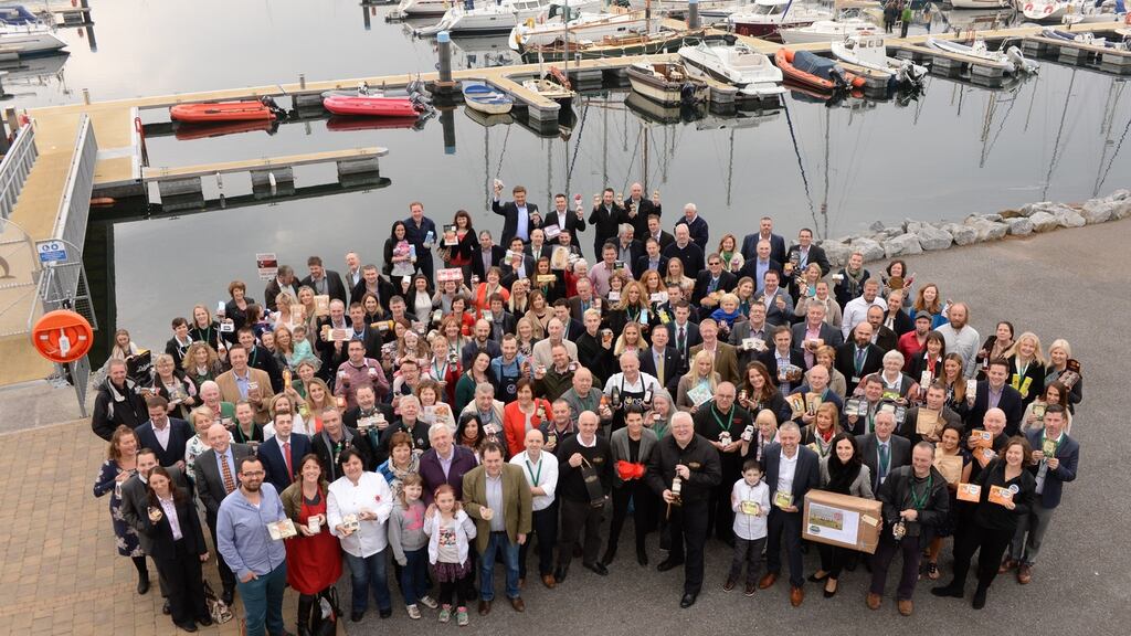 Finalists in the Blas na hÉireann awards gather at Dingle harbour with their products. Photograph: Don MacMonagle