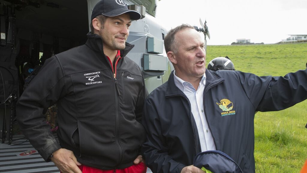 New Zealand Prime Minister John Key meeting with former All Black captain Richie McCaw during his visit to Kaikoura on the South Island’s east coast. Photo: Getty Images