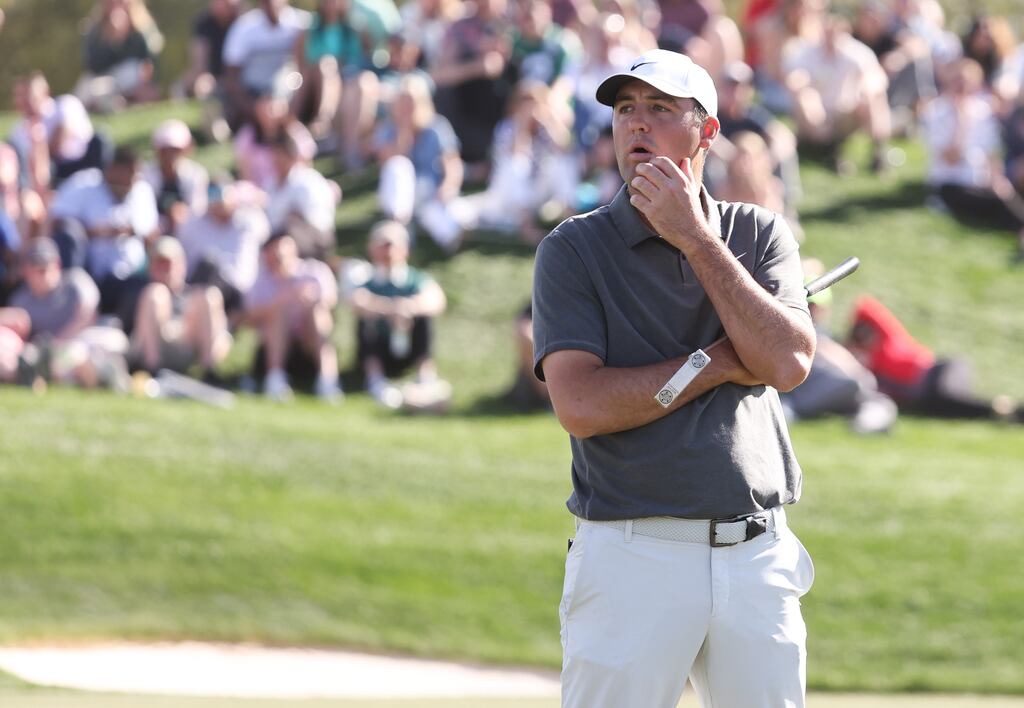 Scottie Scheffler reacts to a missed putt on the eighth green during the third round of the WM Phoenix Open at TPC Scottsdale in Arizona. Photograph: Maddie Meyer/Getty Images