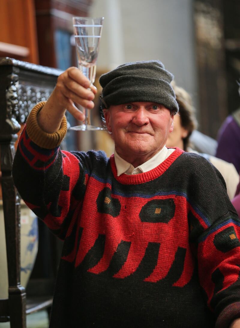 Hugo Harkin at work in Sandycove auctioneering business, Buckley Galleries, which is due to close shortly after sixty years in business.Photograph by Crispin Rodwell for the Irish Times