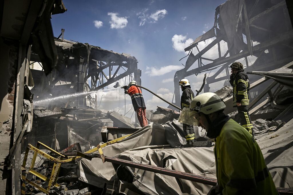 Firemen tackle a fire at a gypsum plant after shelling in the city of Bakhmut at the eastern Ukrainian region of Donbas on Friday.