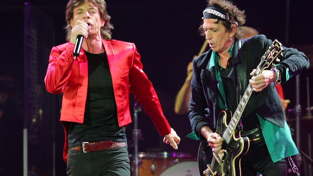 Mick Jagger and Keith Richards of The Rolling Stones take another twirl on their endlessly twirling money-magnet. Photograph: Reuters/Kimimasa Mayama