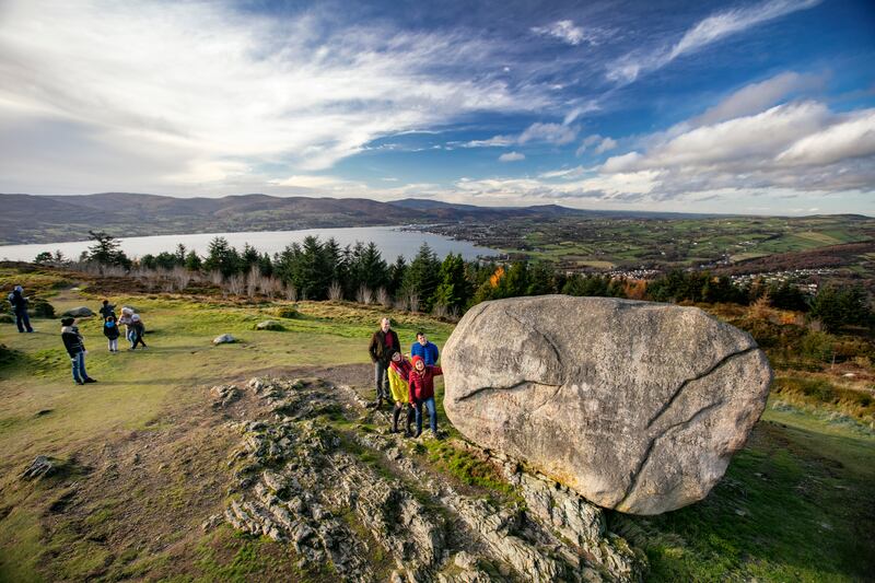 Cloughmore stone, on the slopes of Slieve Martin in Kilbroney Park, overlooking Rostrevor Forest, Carlingford Lough and the Cooley Peninsula. Photograph: Brian Morrison/© Tourism Ireland