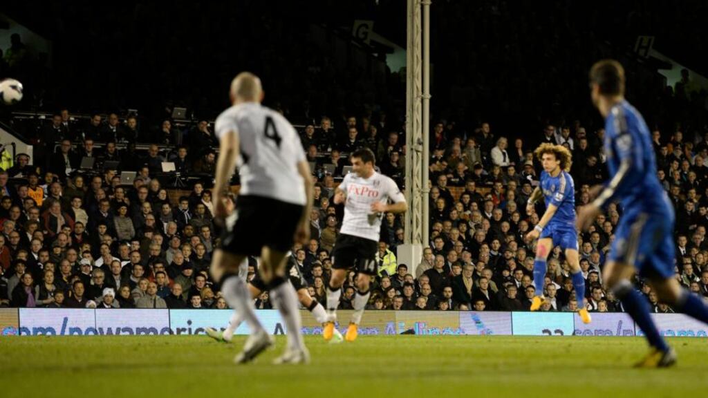 Chelsea's David Luiz opens the scoring against Fulham during the Premier League game at Craven Cottage.   Photograph:  Dylan Martinez/Reuters