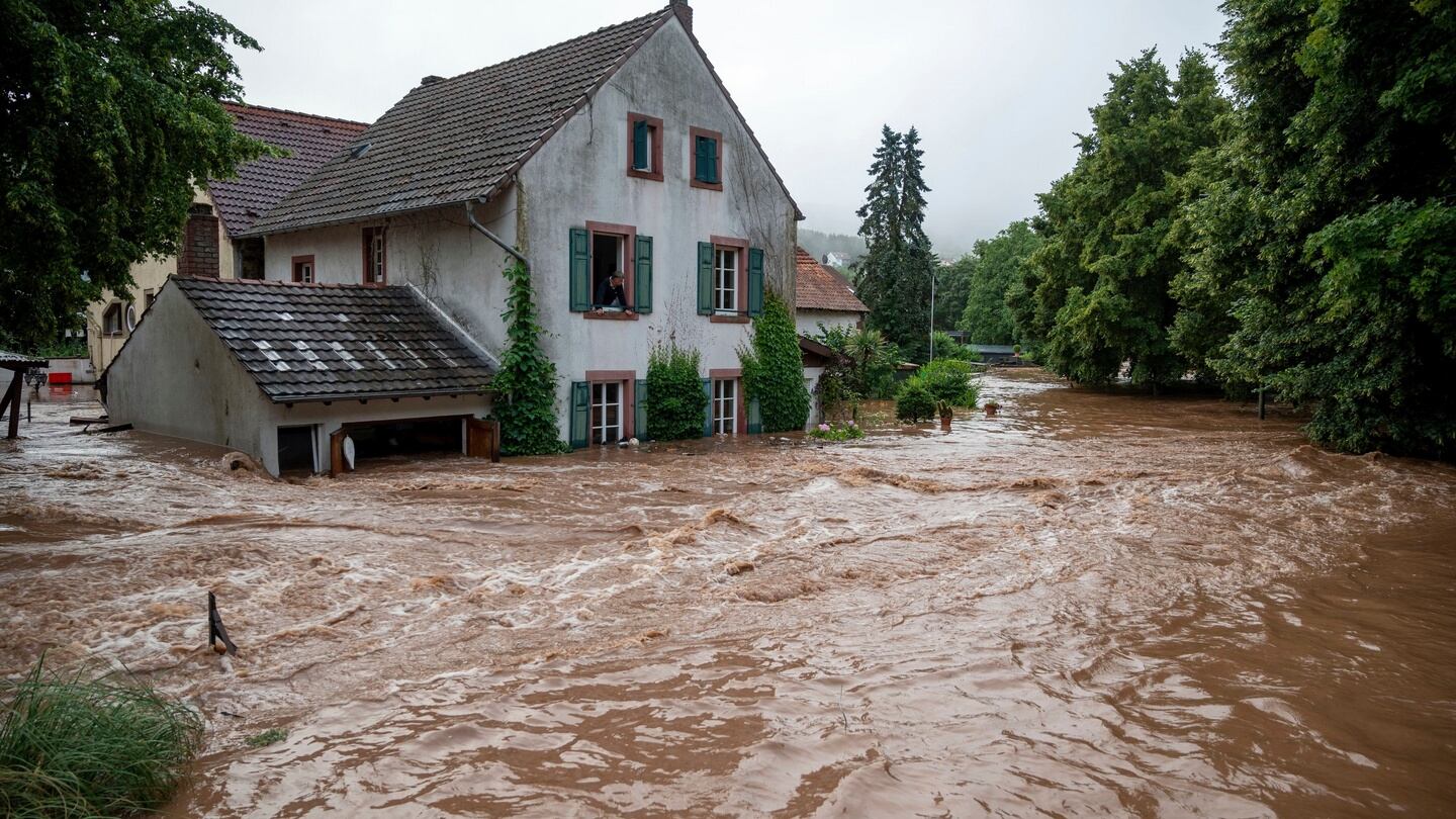 Houses are submerged on the overflowed river banks in Erdorf, Germany. Photograph: Harald Tittel/dpa via AP