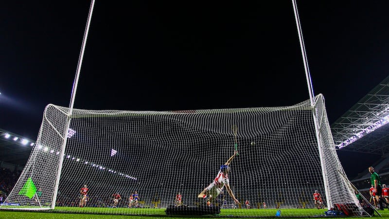 Cork’s Patrick Collins fails to save a penalty from Tipperary’s Brian Hogan. Photograph: Ken Sutton