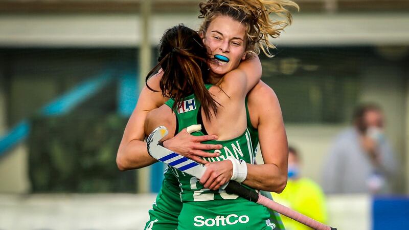 Ireland’s Anna O’Flanagan celebrates scoring her second goal with team-mate  Zara Malseed during the FIH 2022 Women’s Hockey World Cup Qualifer Final against Wales in Pisa. Photograph: Giuseppe Fama/Inpho