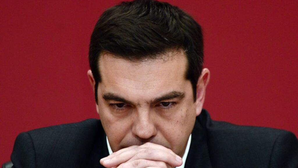 Syriza leader Alexis Tsipras: described as a warm, talkative and witty personality, who likes being around people. Photograph: Louisa Gouliamaki/AFP/Getty Images.