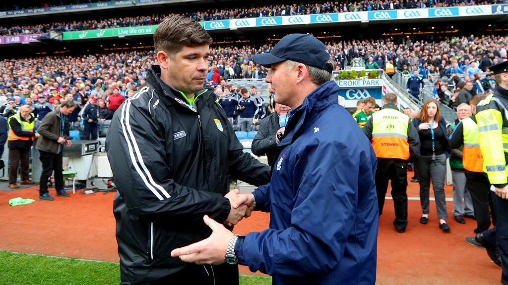 Jim Gavin congratulates Kerry manager Éamonn Fitzmaurice after the game in Croke Park. Photograph: James Crombie/Inpho