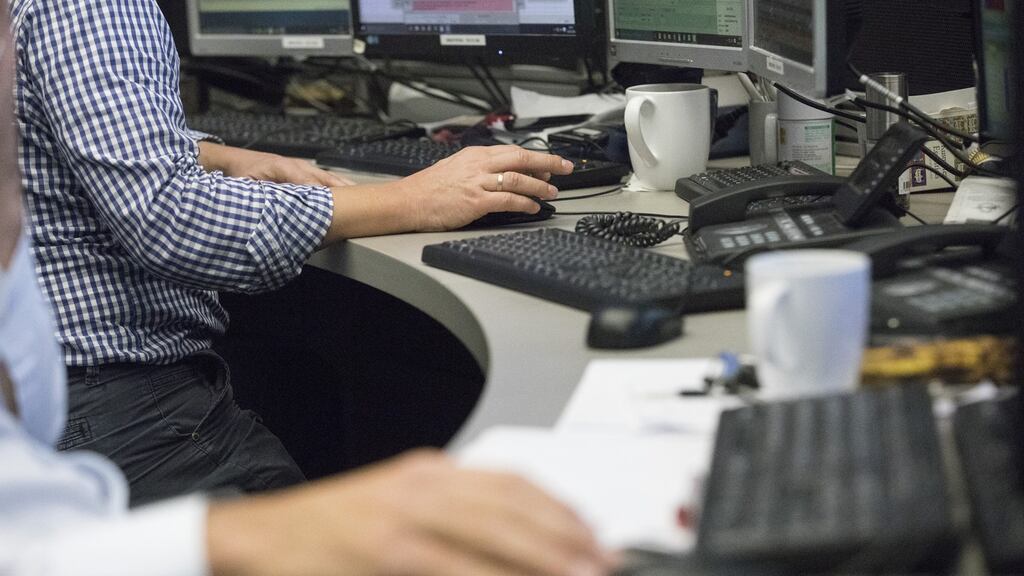 Traders monitor data as the second iteration of the Markets in Financial Instruments Directive (MiFID II) comes into force, at the Frankfurt Stock Exchange. Photograph: Alex Kraus/Bloomberg