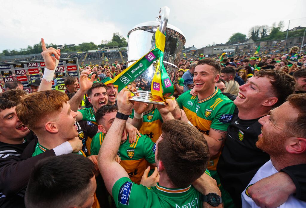 Donegal celebrate with The Anglo Celt Cup after beating Armagh. Photograph: Ryan Byrne/Inpho