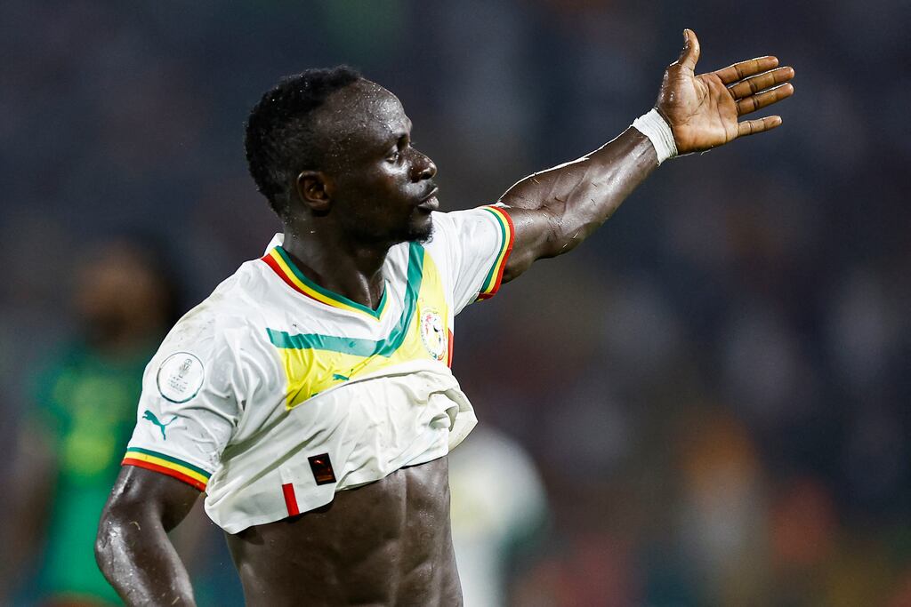 Senegal's winger Sadio Mané celebrates scoring his team's third goal. Photograph: Kenzo Tribouillard/AFP via Getty