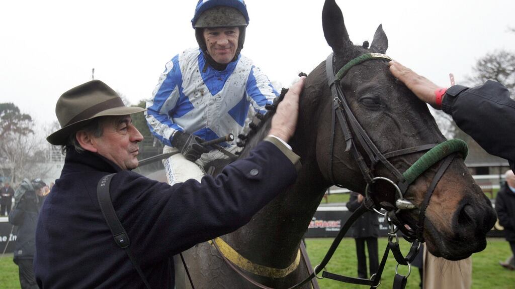 Jockey Paul Carberry and trainer Noel Meade with Realth Dubh at Leopardstown Racecourse