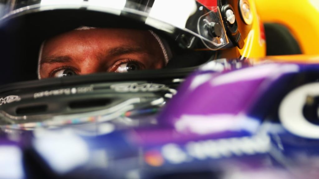 Sebastian Vettel prepares to drive during qualifying for the Indian Formula One Grand Prix at Buddh International Circuit in Noida. Photograph: Mark Thompson/Getty Images