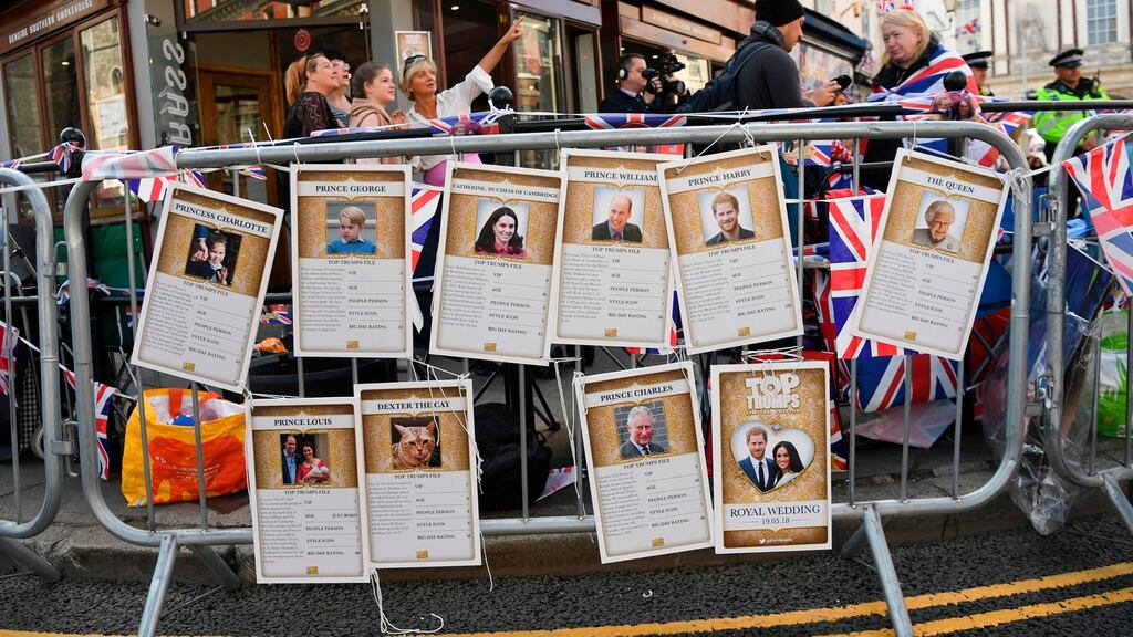 London barriers decorated with a royal family version of the Top Trumps card game. Prince Harry and Meghan Markle will marry on Saturday in Windsor Castle. Photograph: Paul Ellis/AFP/Getty Images