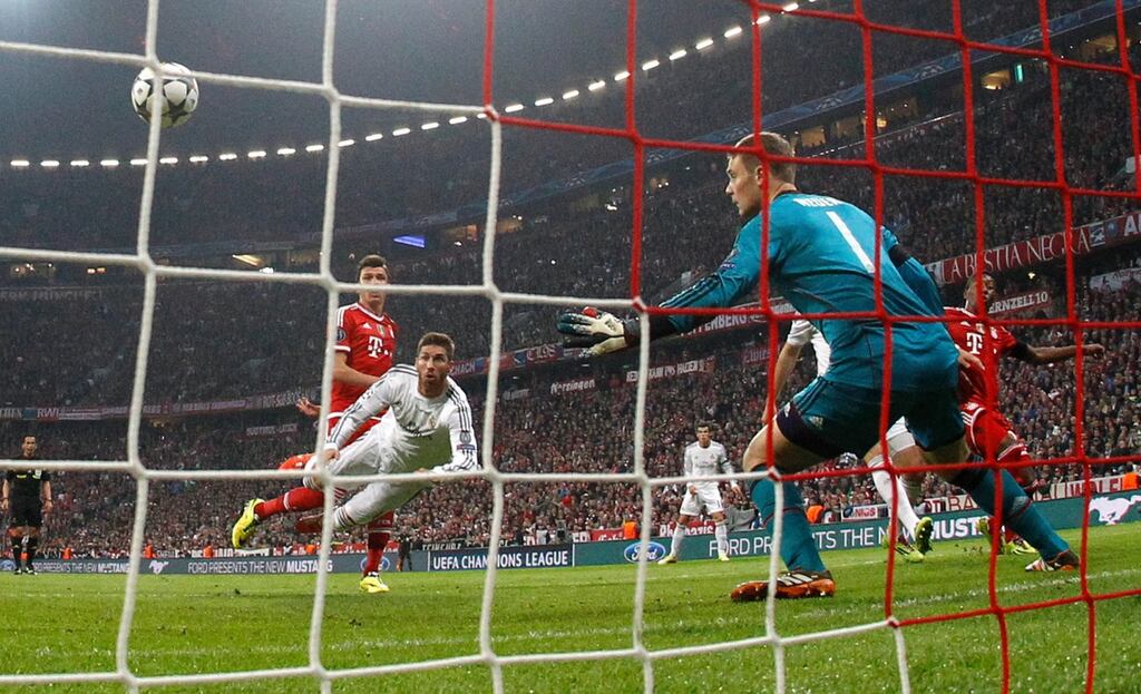 Real’s Sergio Ramos, second left, scores his side’s second goal past Bayern goalkeeper Manuel Neuer during the Champions League semi-final second leg at the Allianz Arena , Munich. Photograph: AP.