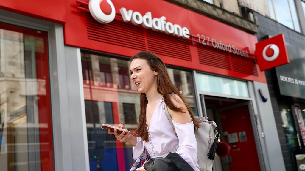Vodafone’s organic service revenue grew more than expected in the third quarter after a solid performance in the UK and Germany offset tough competition in Italy and Spain.
