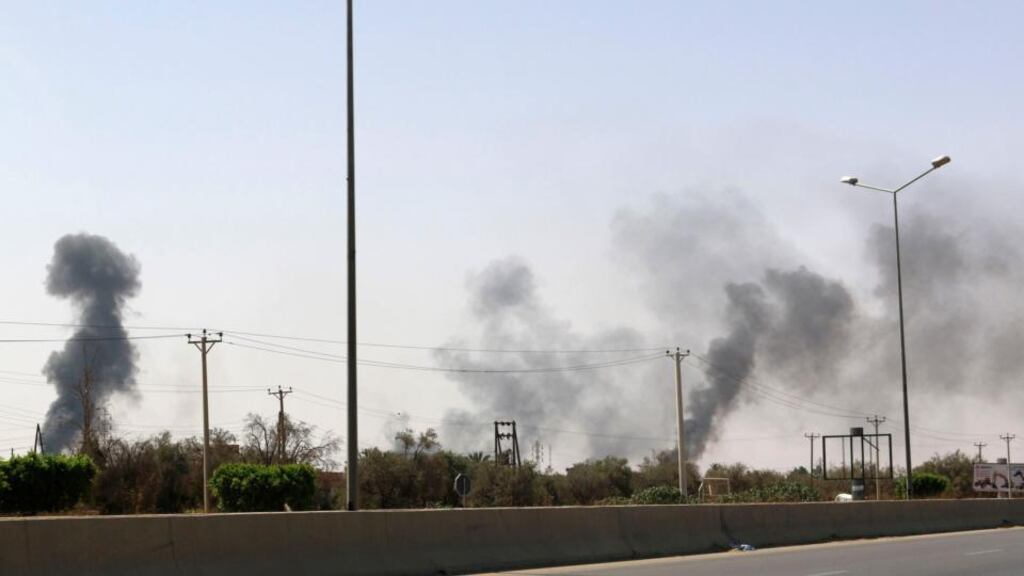 Smoke rises over the airport road area after heavy fighting between rival militias broke out near the airport in Tripoli. Photograph: Reuters